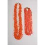 Two miniature coral bead multi strand necklaces.