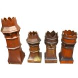 Four salt glazed stoneware chimney pots