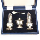 A silver three-piece cruet set by W I Broadway & Co, Birmingham 2001