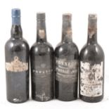 Four assorted bottles of vintage port