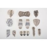 Eighteen 1930's and later white metal dress clips and brooches.
