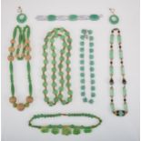Pressed glass and bakelite jewellery simulating jade, necklaces, earrings.