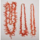 Three graduated branch/twig coral necklaces.