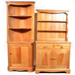 An Ercol Pine kitchen suite