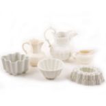 Collection of pottery jelly moulds, etc.