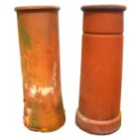 Two terracotta plain cylindrical chimney pots