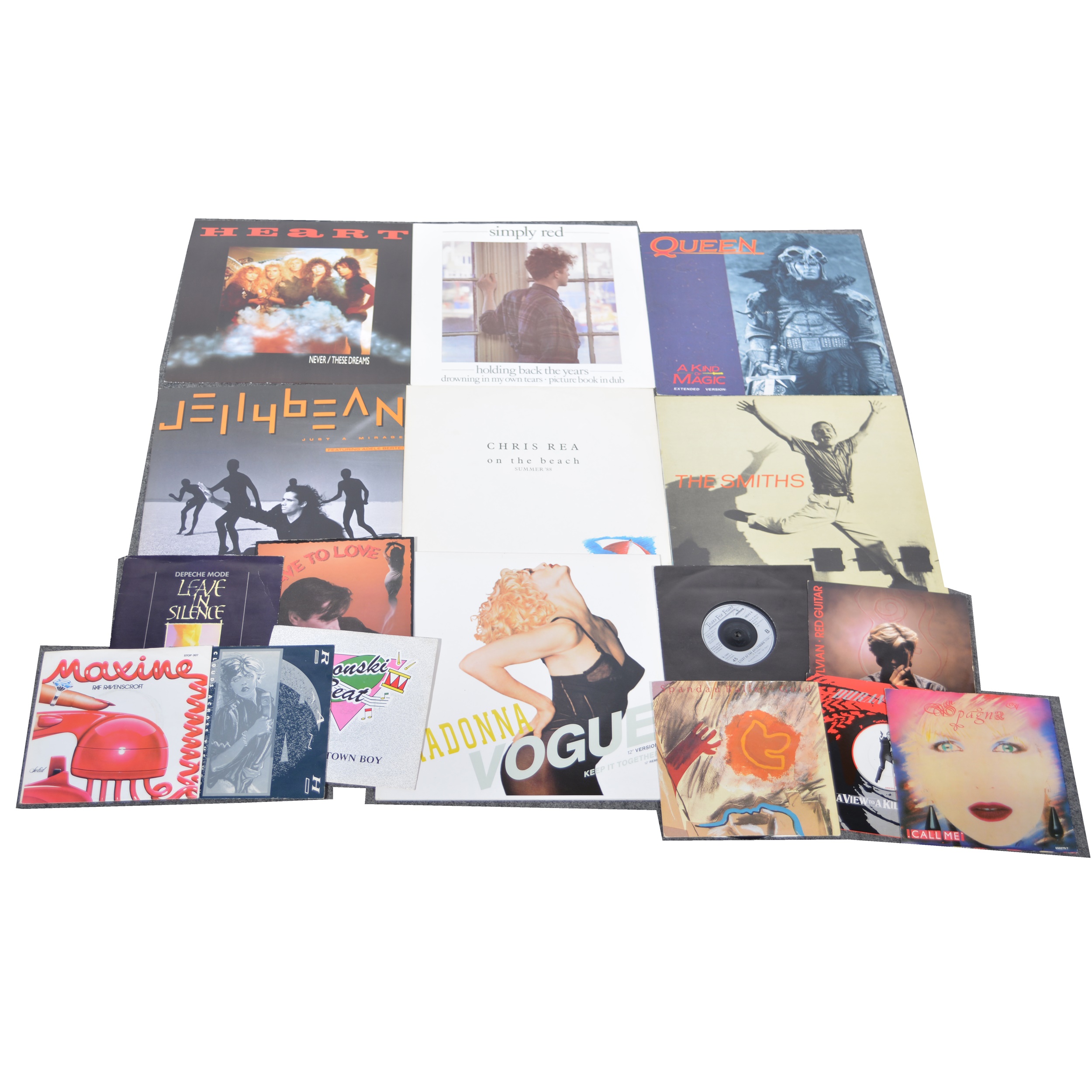 Collection of 12" and 7" vinyl music singles; in a large and small carry case, mostly 1980s pop