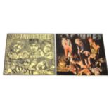 Two Jethro Tull vinyl records; This Was and Stand Up