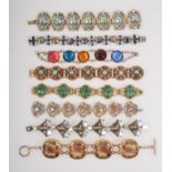 Eight 1950's 1960's colourful paste bracelets.
