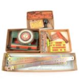 A box of vintage printing sets, stationery items, three ebony trays.