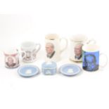 A collection of Churchill commemorative tankards, mugs and other pottery items, including limited