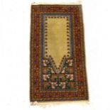 Persian prayer rug and three other rugs