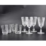 Set of eleven Stuart crystal wine glasses, and seven unmarked matched tumblers.