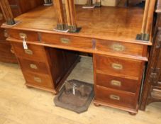 A Campaign style hardwood pedestal desk W.126cm