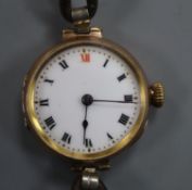 A vintage 9ct gold-cased ladys' wristwatch on leather strap, white enamelled Roman dial