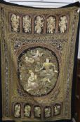 A Burmese large Kalaga sequinned wall hanging, profusely decorated with deities and dragons in