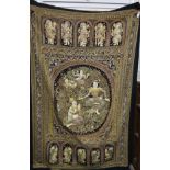 A Burmese large Kalaga sequinned wall hanging, profusely decorated with deities and dragons in
