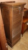 A 1920's oak tambour filing cabinet W.50cm