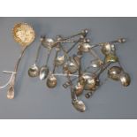 A small collection of silver spoons etc. including thistle end coffee spoons and a sifter spoon.