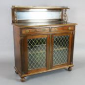 A William IV brass mounted rosewood chiffonier, with three quarter gallery, mirrored back, two