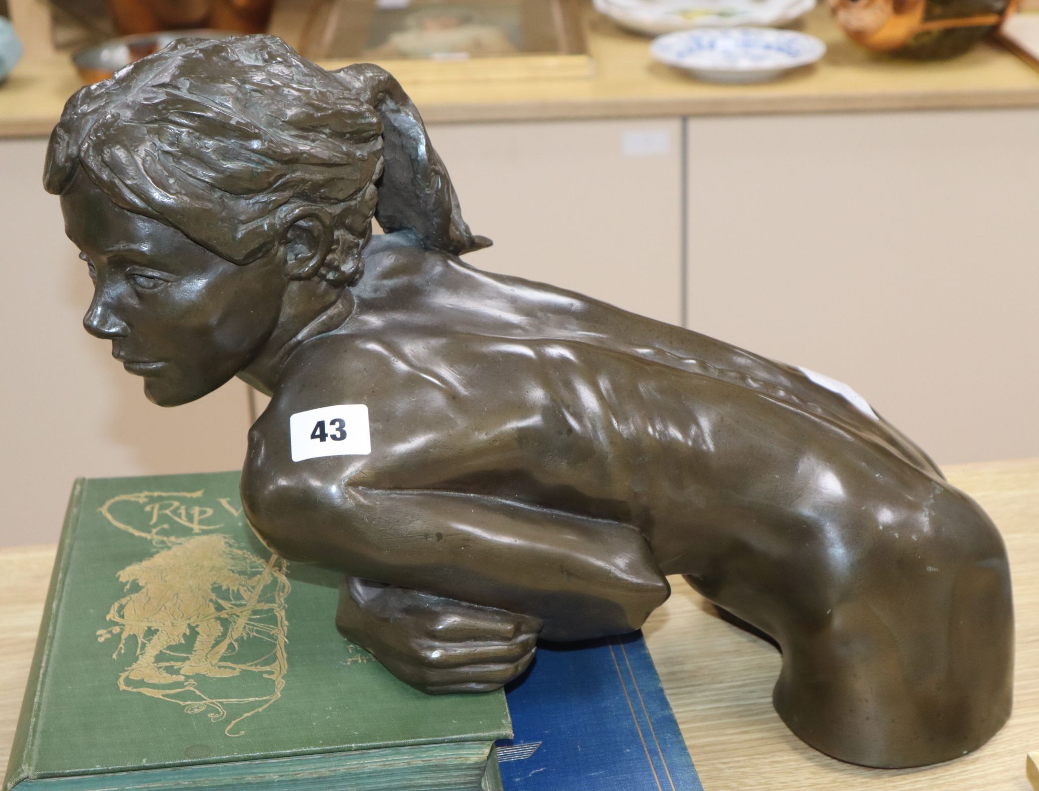 A contemporary resin filled bronze of a girl width 40cm approx,