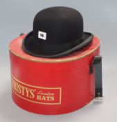 A Harrods lady's bowler hat, in Christy's London box, size 6.75ins.