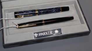 A Parker Duofold Centennial blue marbled fountain pen (boxed) and a Montblanc Classic black fountain