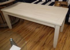 A white painted wooden garden table, with a slatted top 170 x 77cm