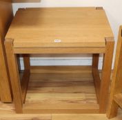 A pair of contemporary rectangular oak occasional tables W.60cm
