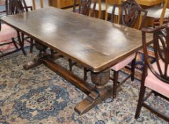 An 18th century style oak rectangular refectory dining table L.184cm