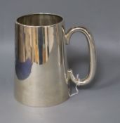 A George V silver pint mug, with glazed base, Robert William Jay, Chester, 1931, 12.8cm.