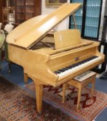 An Allison coromandel banded birds eye maple baby grand piano and stool