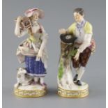 Two Meissen figures of a boy with a bird nest and girl with a bird cage, late 19th century, each