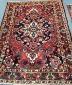 A Hamadan blue ground rug 184 x 120cm