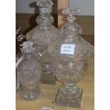 A pair of Regency style glass confitures and covers and a small Regency style decanter (3)