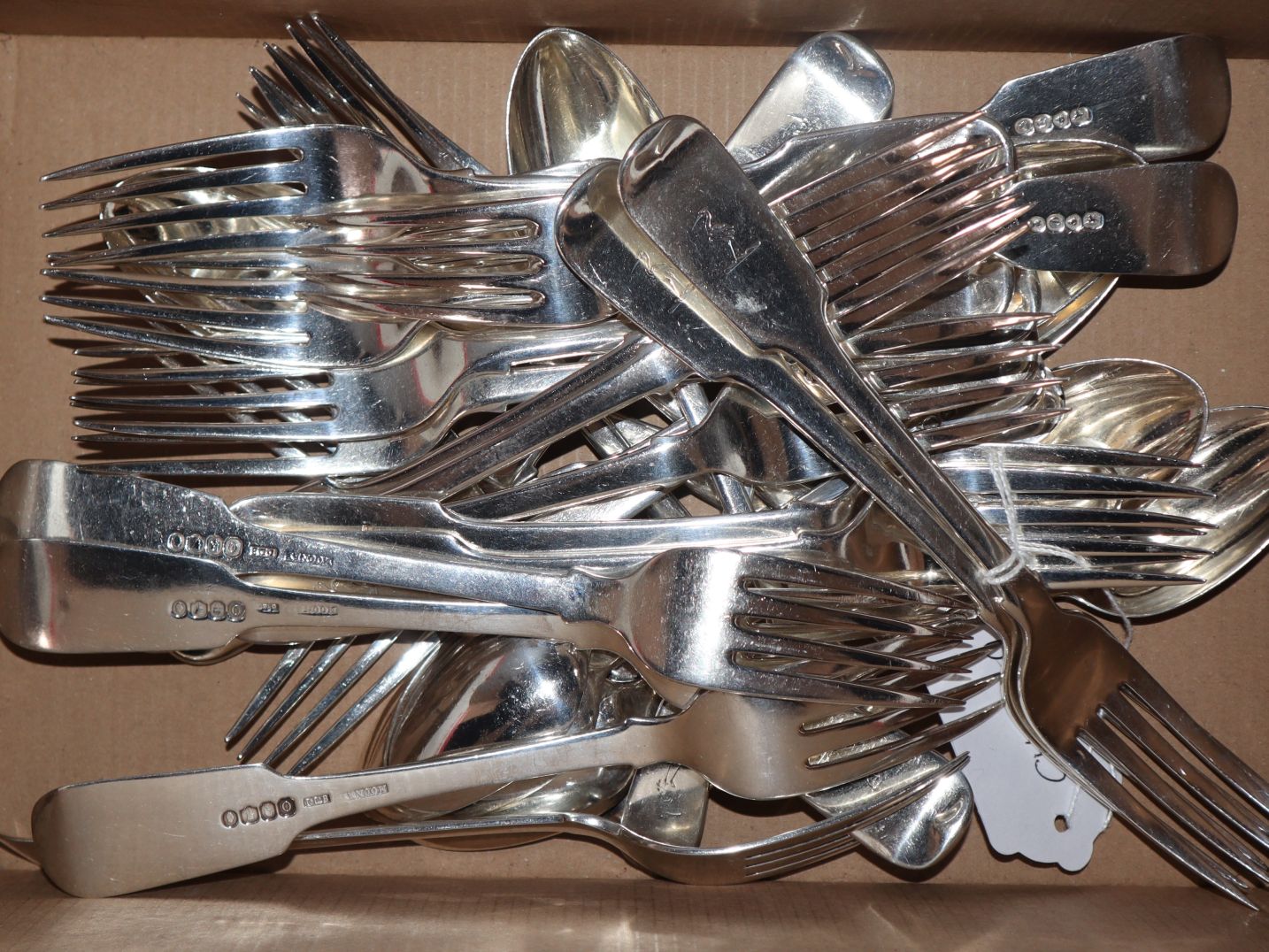 A harlequin part canteen of silver fiddle pattern flatware including eleven William IV Irish