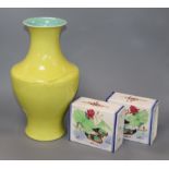 A Chinese yellow ground vase and two pillows height 35cm