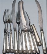 A part set of silver handled knives and forks, c.1800, engraved with RT monogram.