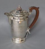 A 1930's silver hot water pot, Birmingham, 1933, gross 11 oz.