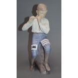 A Bing and Grondahl porcelain figure 'Flute Player', number 1897 height 29cm