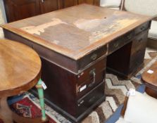 A Victorian mahogany pedestal partner's desk W.155cm