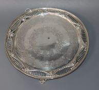 A Victorian engraved silver circular salver, with pierced border, Martin, Hall & Co, London, 1875 (