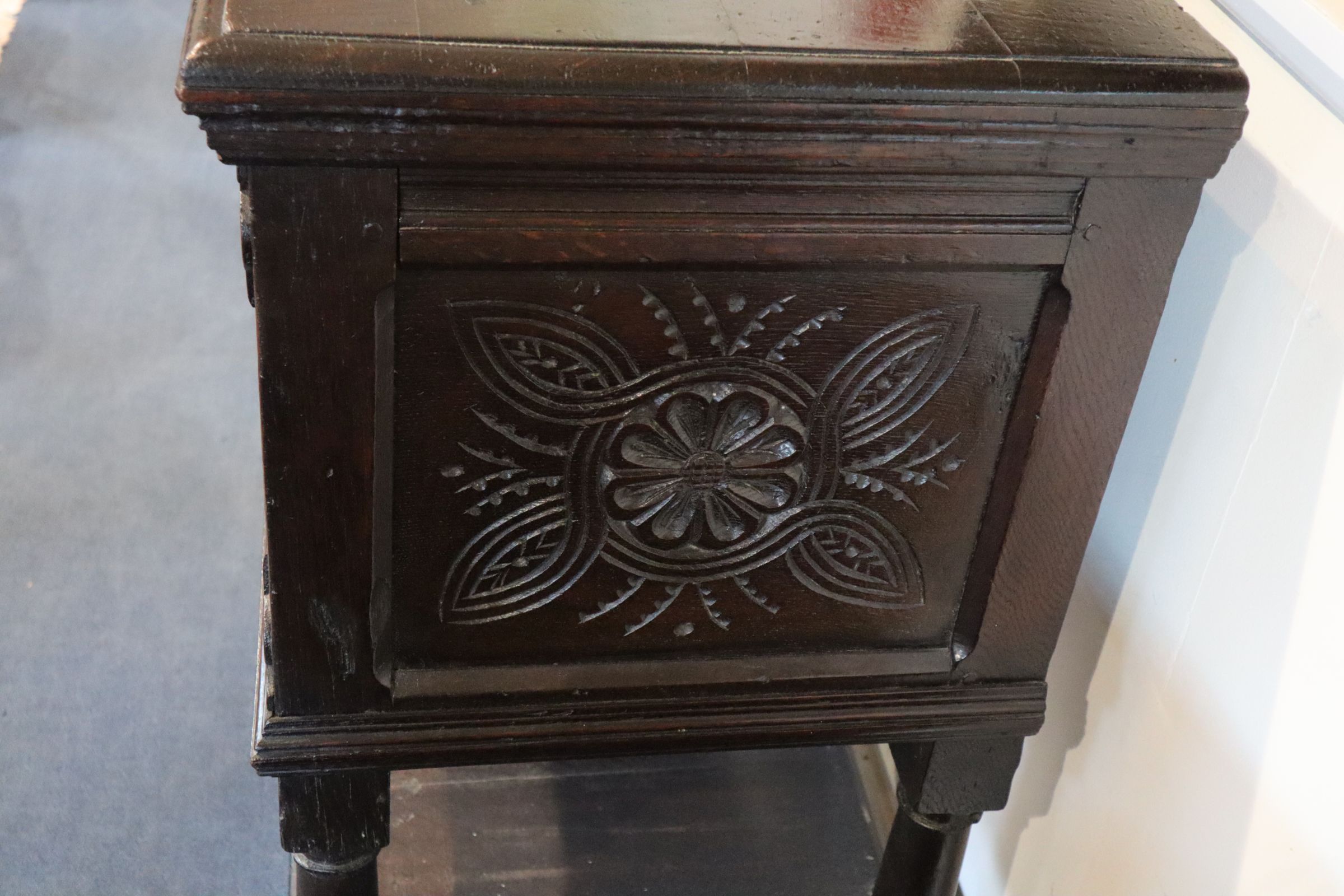 A late 17th century oak cupboard, with foliate, scroll and guilloche carved front panels, turned - Image 3 of 6