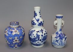 A Chinese double gourd vase, jar and cover and one other vase tallest 20cm