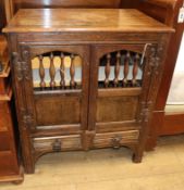 A 17th century style oak 'hutch' cupboard W.83cm