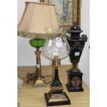 A Victorian style 'oil lamp', a candlestick with storm shade and a faux marble and gilt metal urn (