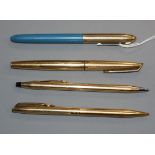 Two gold Waterman pens and two others