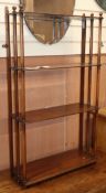 A Regency mahogany four tier wall shelf W.62cm