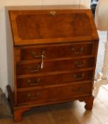 A George III style walnut bureau W.74cm