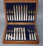A set of twelve pairs of George V dessert knives and forks, Frederick C. Asman & Co, Sheffield 1917,